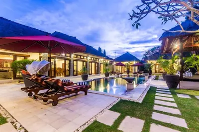 a villa with a swimming pool and a resort at Luxury Villa AnTan Central Seminyak in Seminyak