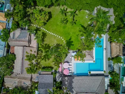an aerial view of a house with a yard at Villa Kalis, 10 BR family and group Villa in Seminyak