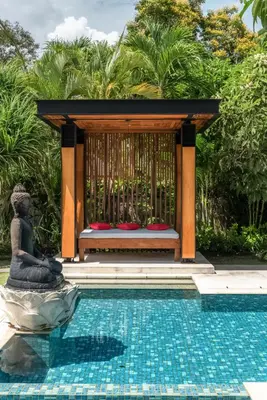 a gazebo next to a swimming pool at New Villa Selamanya in Ujung