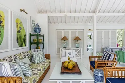 a living room with a couch and a table at Pineapple Hill 4 Bed Luxury in Seminyak
