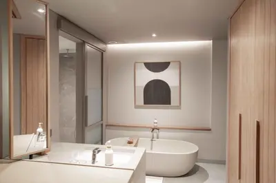 a bathroom with a tub and a sink and a bath tub at Sin Nombre Bali - Sauna, Ice Bath & Roof Terrace in Canggu