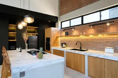 a kitchen with a counter with a pineapple on it at Manresa Villa Bali 2 in Canggu