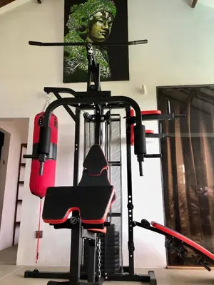 a room with a gym with a treadmill at Villa Denira in Nusa Dua