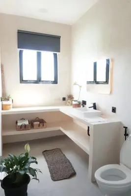 a bathroom with a sink and a toilet at Stella Moon Villa Bali in Kerobokan