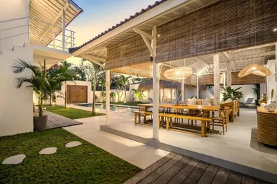 an outdoor dining area of a villa at Villa Surga Julie by Alfred in Bali in Seminyak