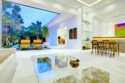 a living room with a table and chairs at Villa Jonas seminyak Bali in Seminyak