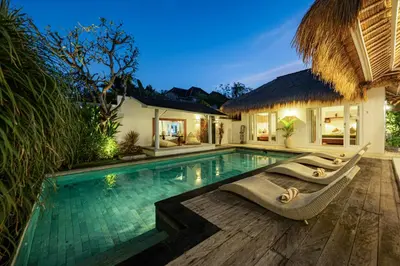 a villa with a swimming pool and a resort at Newly renovated Villa Noa by Optimum Bali Villas in Seminyak