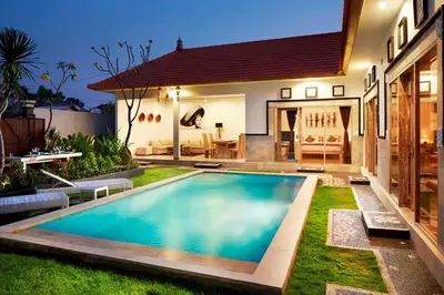 a swimming pool in the backyard of a house at Sol Bella VIlla 1 in Seminyak