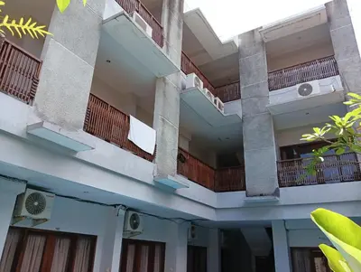 an external view of a building with balconies at Tama Seminyak Town House in Kerobokan