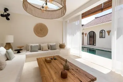 a living room with a couch and a table at Casa Adem - Modern & Trendy 3BR Villa in Seminyak, 10 Minutes to the Beach with Private Pool in Seminyak