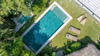 an overhead view of a swimming pool in a yard at Villa Nak - Charming 4BR Family-Friendly Villa, Walking Distance to Seminyak Beach in Seminyak