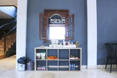 a shelf in a room with a window at Aiwan Hostel & Luggage storage in Sanur