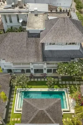 an overhead view of a house with a swimming pool at Beachside Colonial Elegance: 4BR in Canggu in Canggu