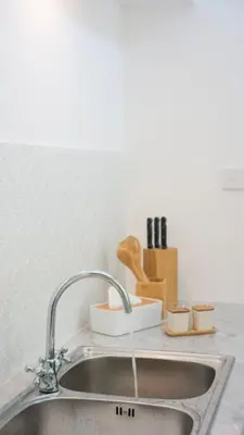 a kitchen sink with a faucet on a counter at New Villa Lotus 2BR Private Pool Villas in Seminyak