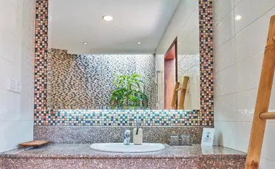 a bathroom with a sink and a mirror at Dreamscape Bali Villas Canggu in Canggu