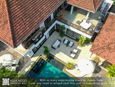 an overhead view of a house with a swimming pool at Noco Luxury Villa Seminyak in Seminyak