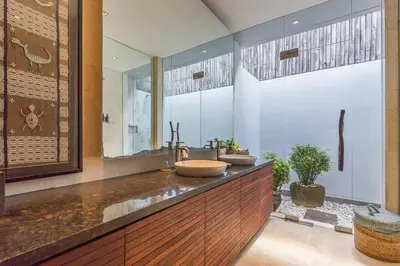 a bathroom with two sinks on a counter at Eshara 23 an Amazing 5 BR Pool Villa walking distance to Beach in Seminyak