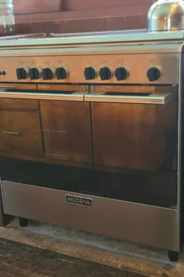 a stove top oven sitting in a kitchen at Jado 1 Unique Cinema Entertainment Villa in Umalas in Kerobokan