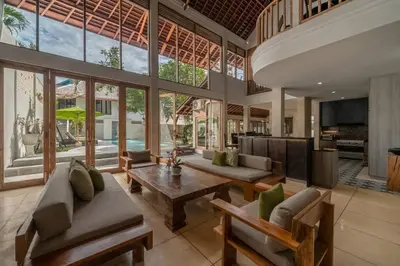 a living room with couches and a table at Balinese Luxury Amisha Villa: 4BR in Seminyak in Seminyak