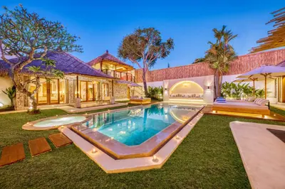 an exterior view of a house with a swimming pool at Villa Miami - New Luxury 7BDR Prime Location in Seminyak