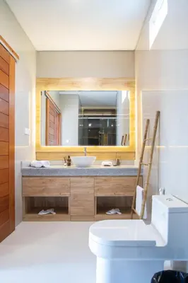 a bathroom with a sink and a mirror at Sundaze 2 - Canggu Paradise with Pool and Kitchen Brand NEW in Kerobokan