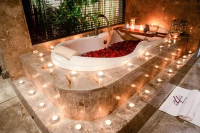 a bath tub filled with lots of red peppers at Focus on 4 in Seminyak