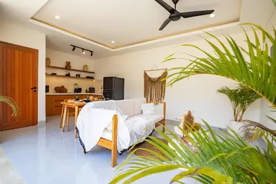 a living room with a couch and a table at Balibay 1 - Private Villa with Pool in Canggu in Kerobokan