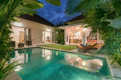 a swimming pool in the backyard of a villa at Villa Briana Seminyak by Villas R Us in Seminyak
