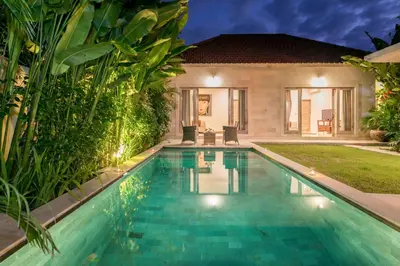 a swimming pool in the backyard of a villa at Villa Briana Seminyak by Villas R Us in Seminyak