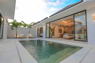 a villa with a swimming pool in a backyard at Villa Efire-3 bedroom with pool in Seminyak