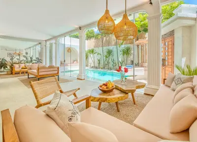 a living room with a couch and a table at Villa San Diego: Brand New 4BDR in Seminyak