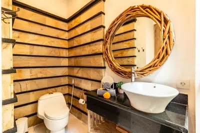 a bathroom with a sink and a mirror at PROMO DEAL Sweet Unique Hidden Gem 2 BD Villa - CONSTRUCTION NEARBY in Kerobokan