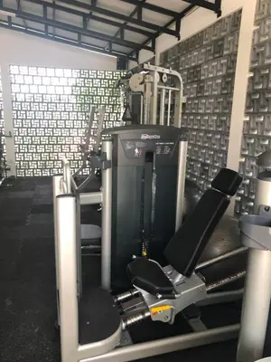 a gym with a row of treadmills and machines at Two-Bedroom Pool Villa at Anwa Residences in Canggu