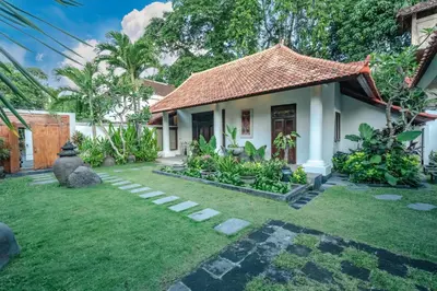 a small house with a grass yard in front of it at 5 Bedroom Villa Etnik in Seminyak with Big Garden and Private Pool in Seminyak