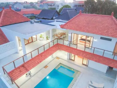 an aerial view of a house with a swimming pool at Villa Amil Seminyak in Seminyak