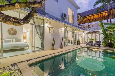 an exterior view of a villa with a swimming pool at Cosy 3 BR villa with private pool in Seminyak in Seminyak