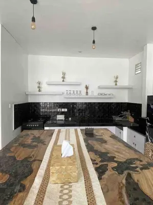 a large white room with a large room with a floor at UMARA villa bali x villa aydin kerobokan bali in Seminyak