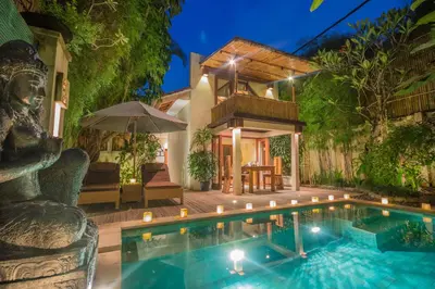 a villa with a swimming pool and a house at Villa Seriska Seminyak, 5-Star Private Pool Villa, Walk to Dining & Shopping in Seminyak