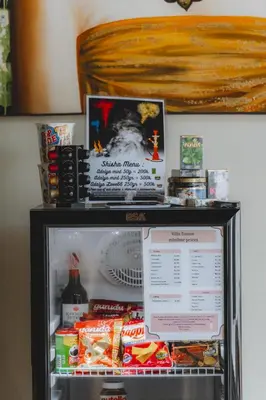 a refrigerator with food and drinks in it at Taman pangeran villa in Seminyak, 2BR large pool, Prime Location ! in Seminyak