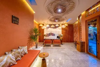 a living room with a couch and a table at Modern 1BR Private Pool Villa With Bathtub in Seminyak
