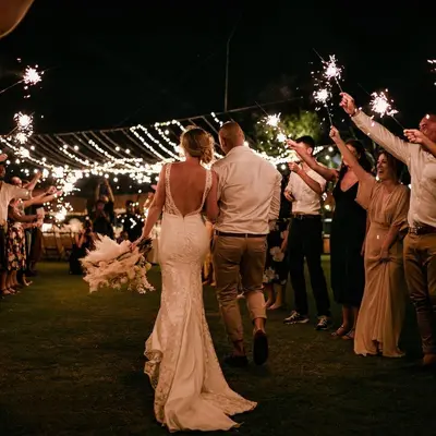 a bride and groom walking down the aisle at their wedding at ATLAS BEACH FEST CHILL 6bed VILLA LOVED by BiG GROUPS EASY Walk to Beach in Canggu