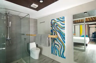 a bathroom with a shower and a toilet and a bedroom at 3BR Villa Kita - Minggu Villas-Special Stay Bonus in Seminyak