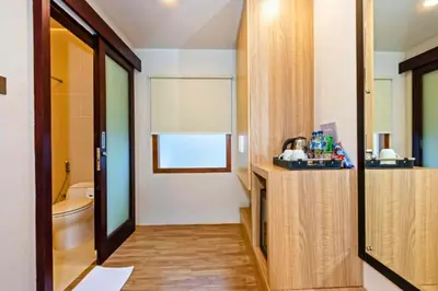 a bathroom with a sink and a toilet in a room at Luxury 1 BR Deluxe Twin Room in Canggu