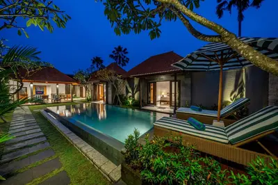an image of a villa with a swimming pool at Villa MD 2 Stylish 3 BR w/ Sunny Pool at Prime Eat Street in Seminyak