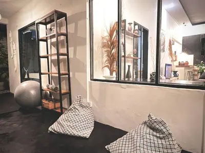 a room with two sculptures in front of a window at 2 BR Villa Rhapsody - 5 Mins to Seminyak/Umalas in Seminyak