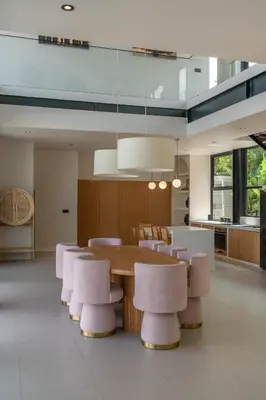 a dining room with a table and chairs at Villa Maverick - Brand New Classy 4BR Villa in Canggu in Canggu