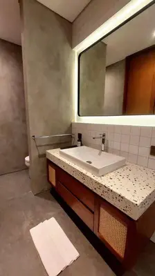 a bathroom with a sink and a mirror at Akhila 1 - 1 BR modern tropical villa at the heart of Seminyak in Seminyak