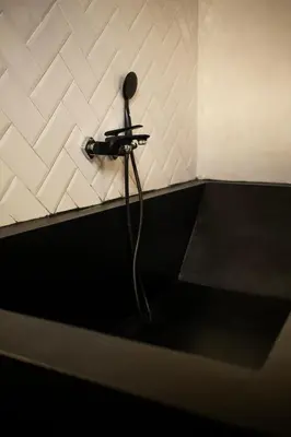 a hair dryer on a wall in a room at Tropical Loft Steps Away from the Beach! Hidden GEM! in Canggu