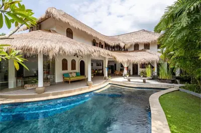 a villa with a swimming pool and a resort at Rose 2BR Private Pool Villa in Kerobokan
