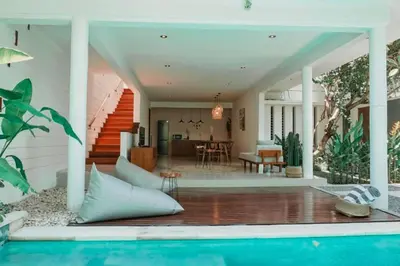 a home with a swimming pool and a house at Luxury 2 BR Private Pool Villa ZN101 in Seminyak
